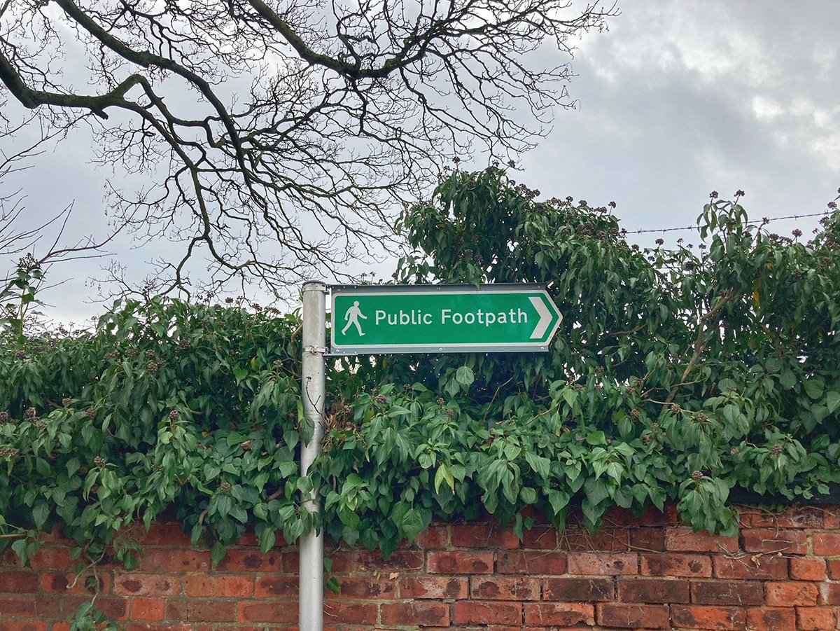 Photograph of Footpath sign on West Road